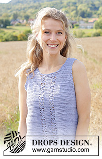 Lotus River / DROPS 250-10 - Crocheted top in DROPS Safran. The piece is worked back and forth, bottom up with lace pattern and split in sides. Sizes S - XXXL.